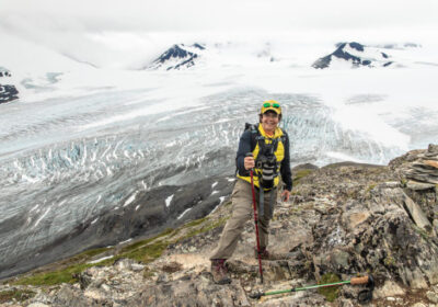 hiker on glacier alaska